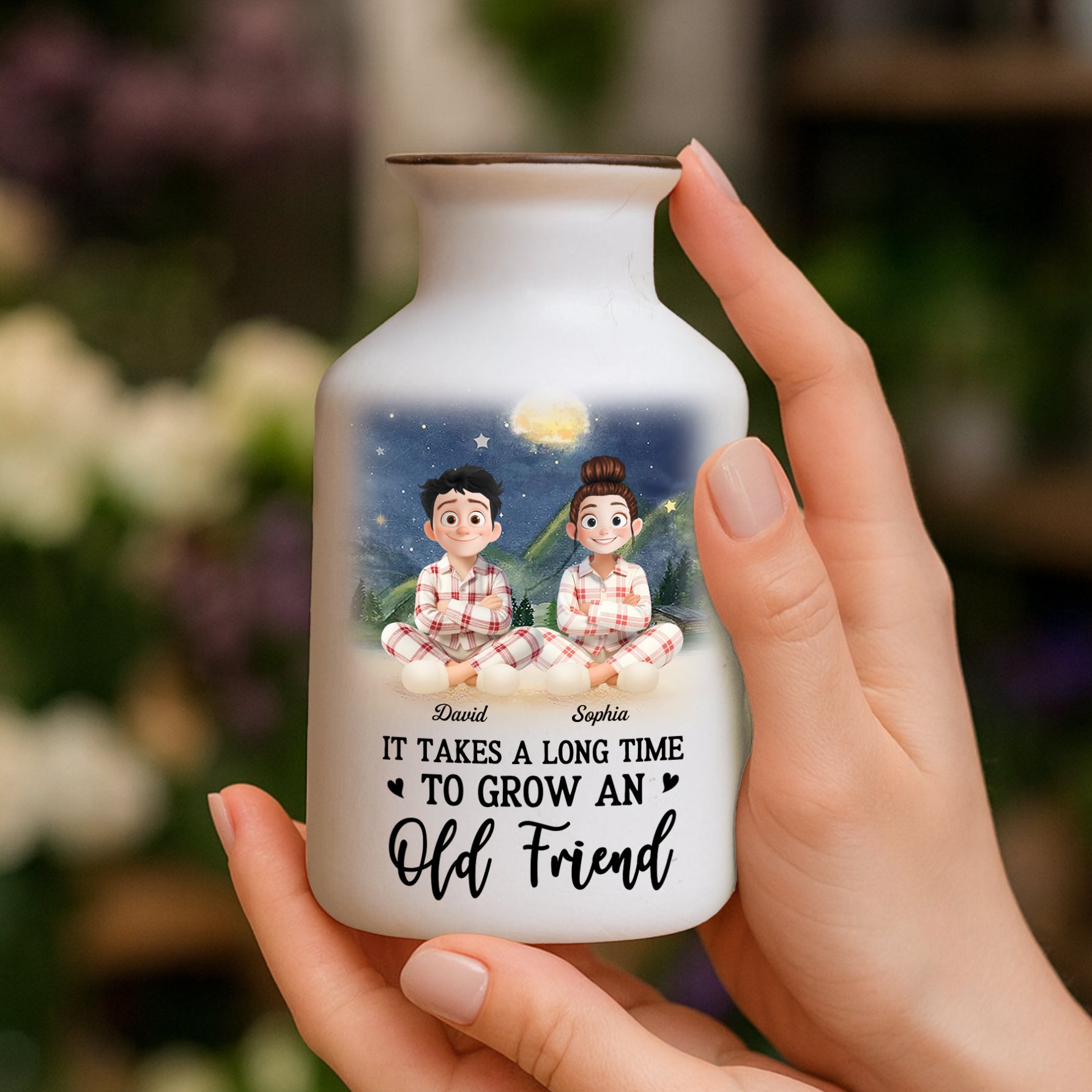 Personalized white ceramic flower vase with "It Takes a Long Time to Grow an Old Friend" inscription.