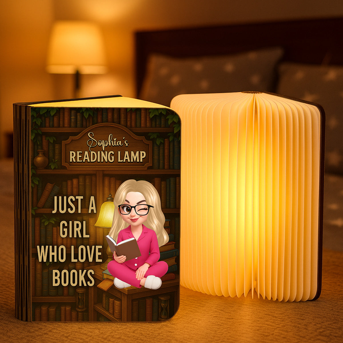 Just a Girl Who Loves Books Personalized Book Lamp, warmly lit and showcasing custom engraving.