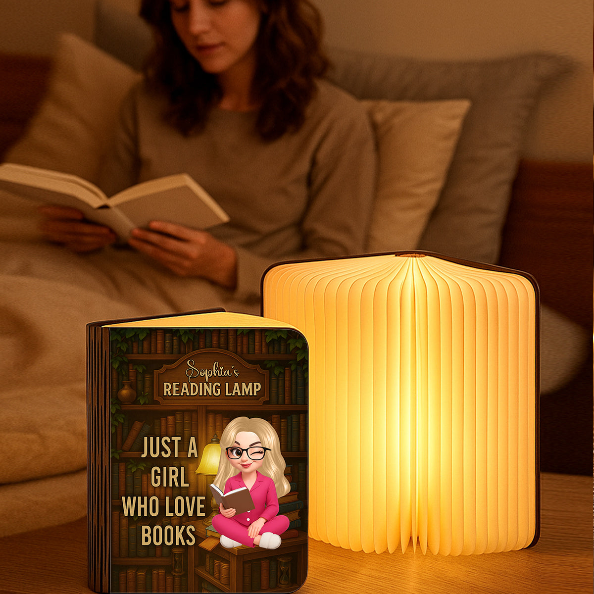 Just a Girl Who Loves Books Personalized Book Lamp, warmly lit and showcasing custom engraving.