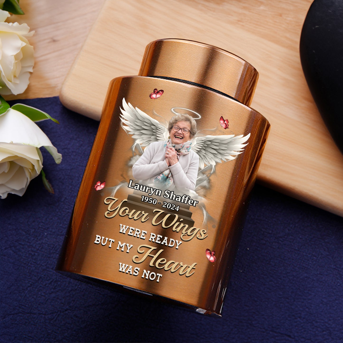 Memorial Wings Keepsake Urn for Ashes, crafted from stainless steel, a beautiful and lasting tribute.