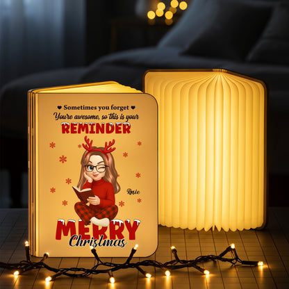 Personalized "Merry Christmas Awesome" book lamp, a unique holiday gift from Jillian Customs.