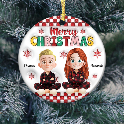 Personalized "Merry Christmas Family" ceramic ornament with custom names. A festive holiday keepsake.