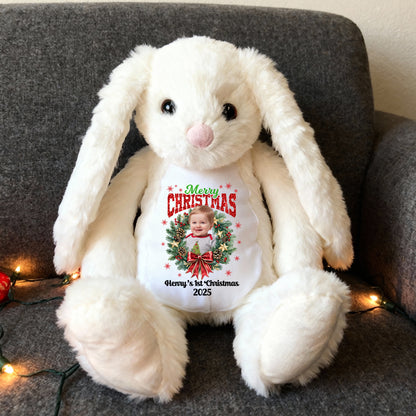 Merry Christmas Plush Stuffed Bunny Rabbit wearing a festive red Santa hat.
