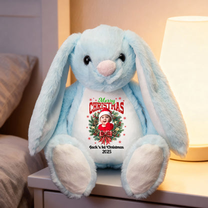 Merry Christmas Plush Stuffed Bunny Rabbit wearing a festive red Santa hat.