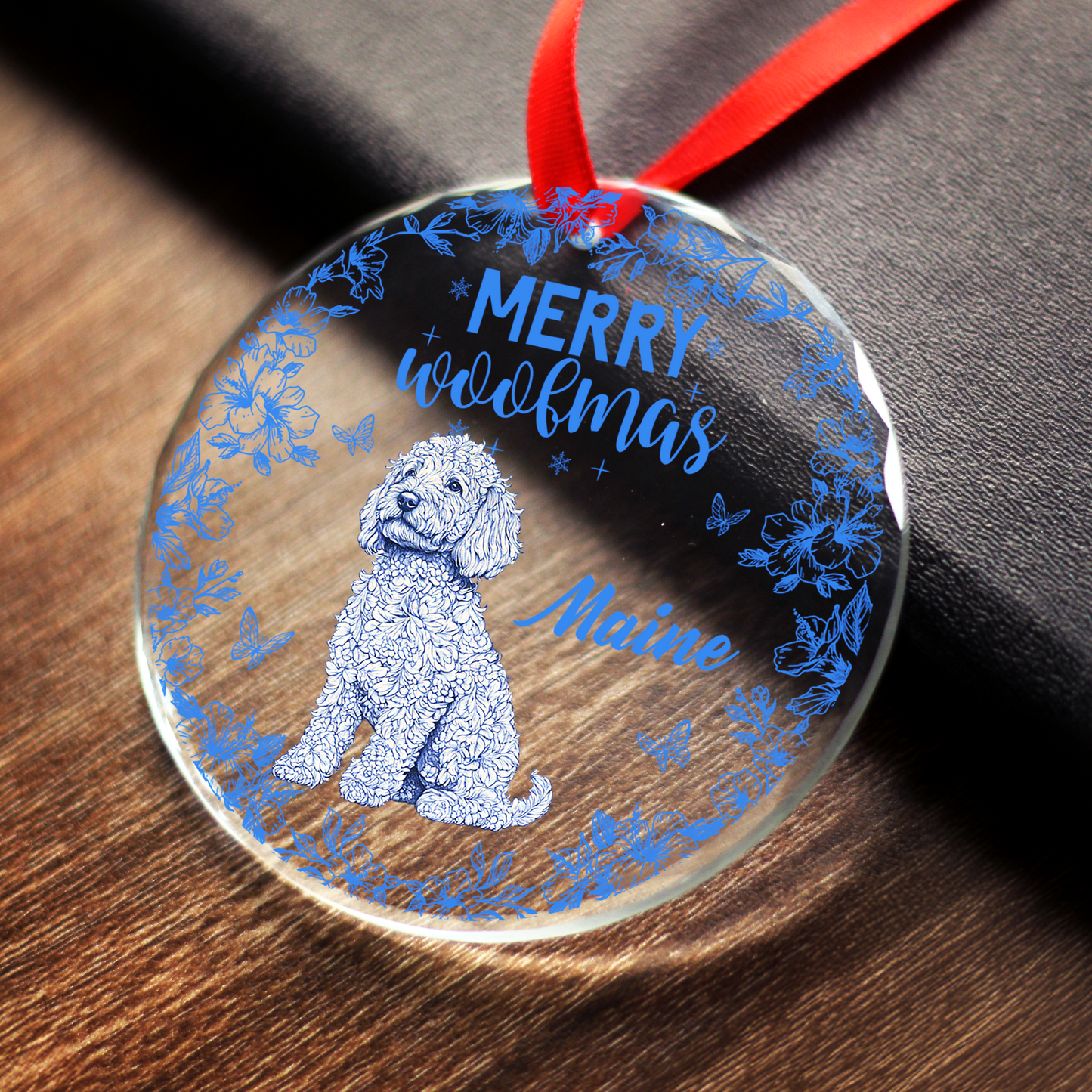 Merry Woofmas personalized dog Christmas ornament with cute paw prints.