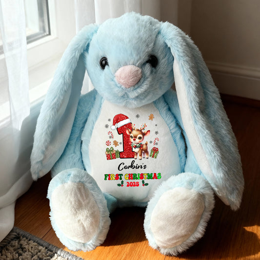 My First Christmas plush bunny rabbit with festive red bow and embroidered details.