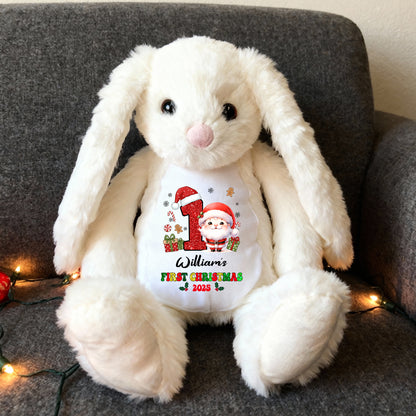 My First Christmas plush bunny rabbit with festive red bow and embroidered details.