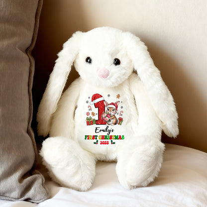 My First Christmas plush bunny rabbit with festive red bow and embroidered details.