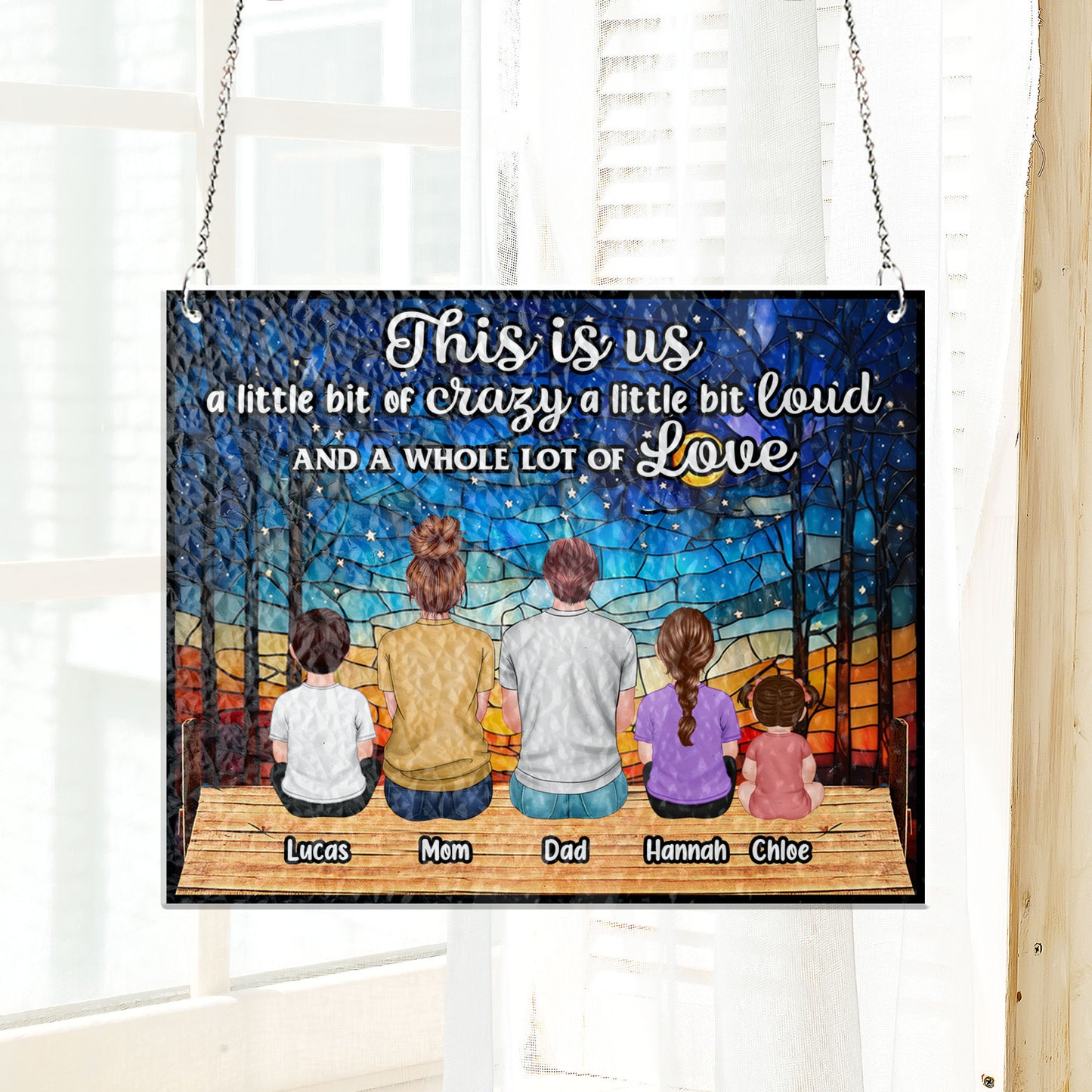 Personalized family photo stained glass suncatcher hanging in a bright window, customized with your picture.