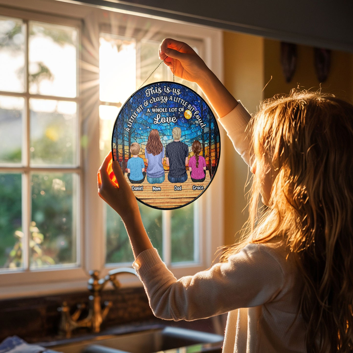 Personalized family photo stained glass suncatcher hanging in a bright window, customized with your picture.