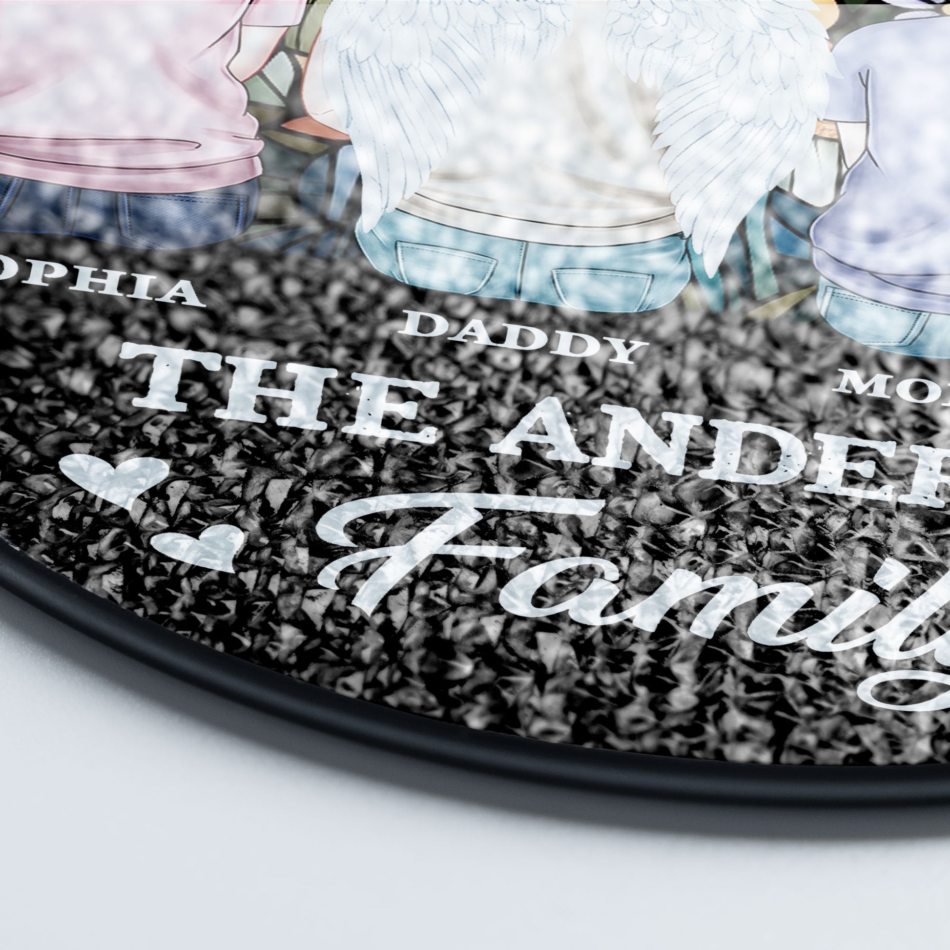 Personalized family photo stained glass suncatcher hanging in a window.