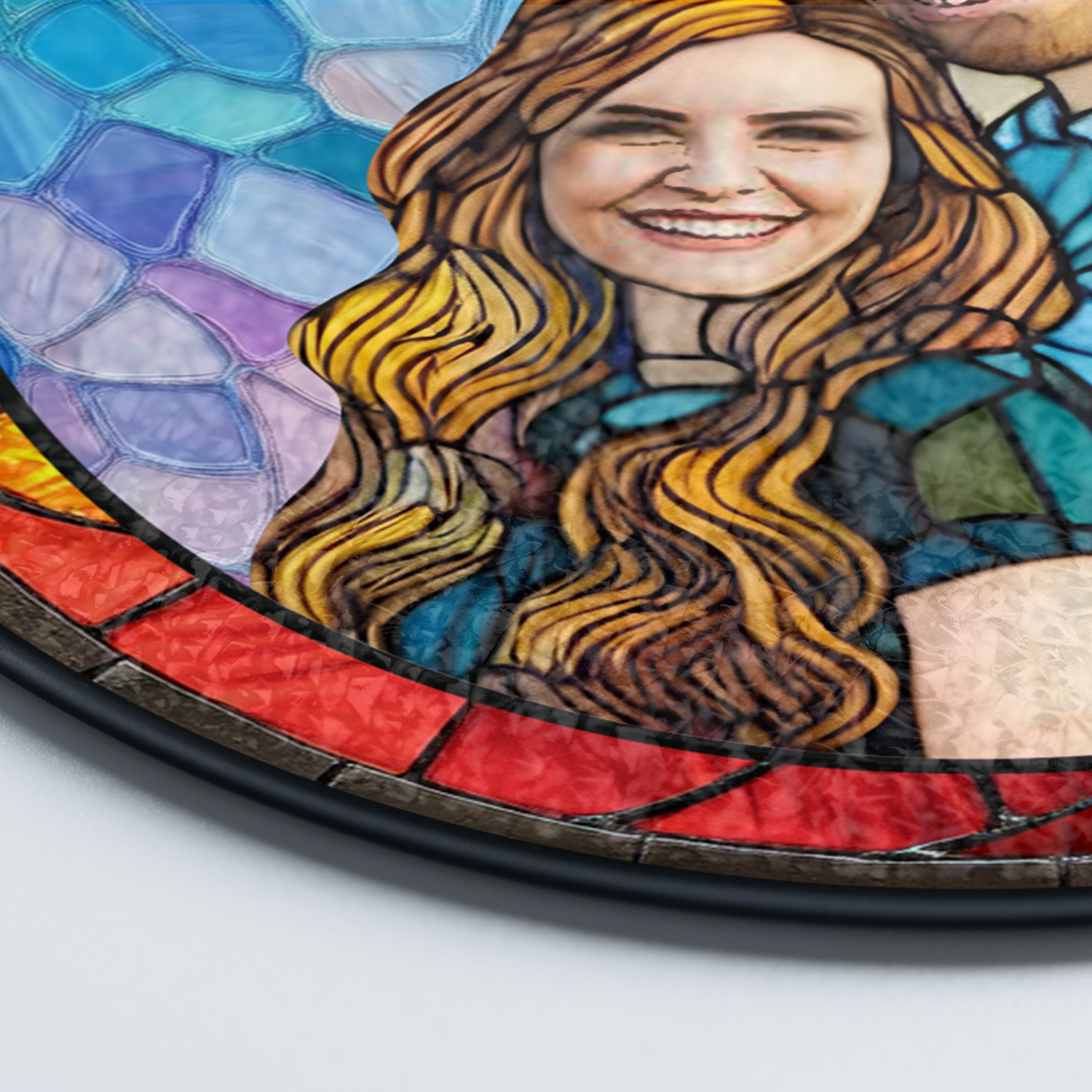 Personalized family photo stained glass suncatcher hanging in a window.