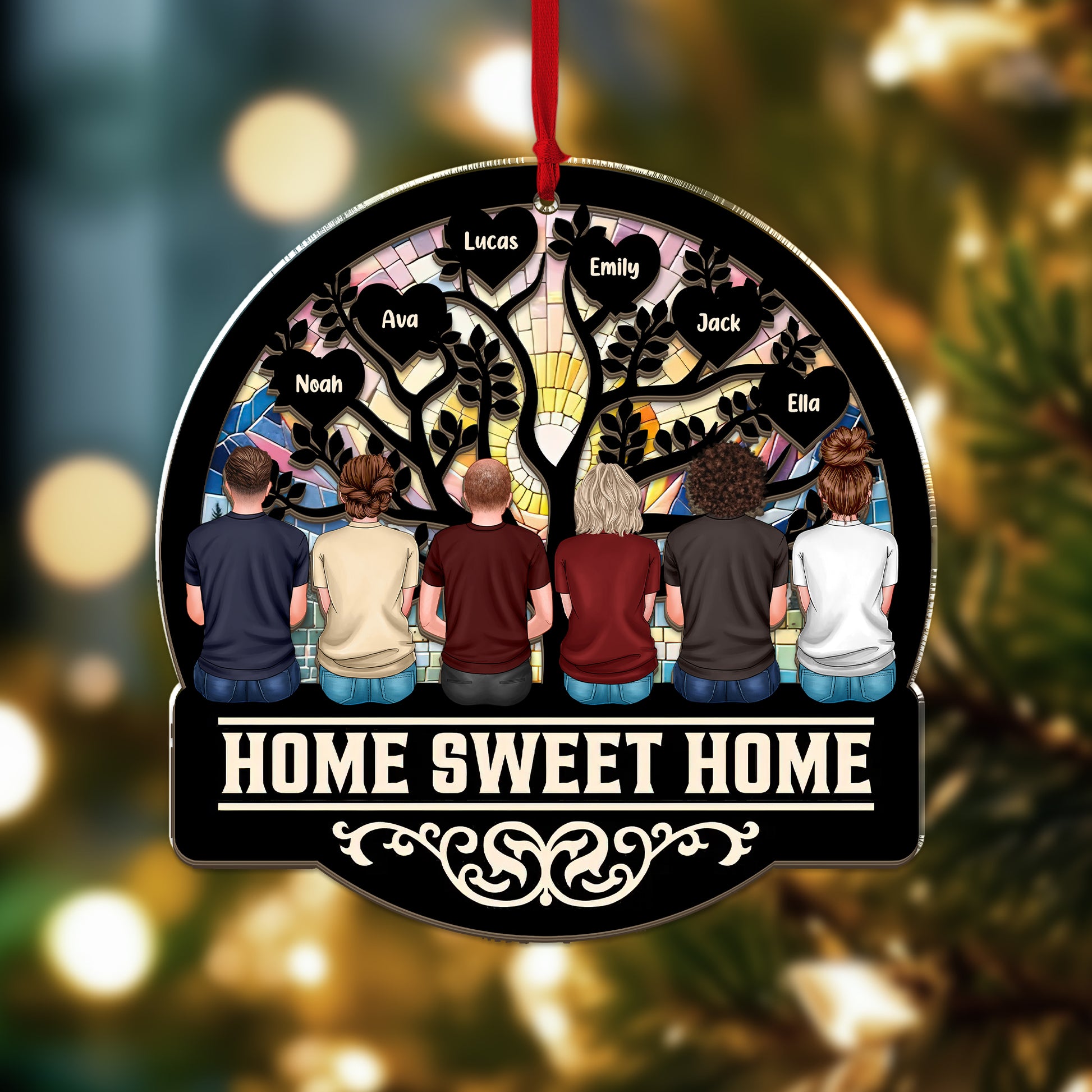 Personalized "Our Family This Christmas" window suncatcher ornament hanging.