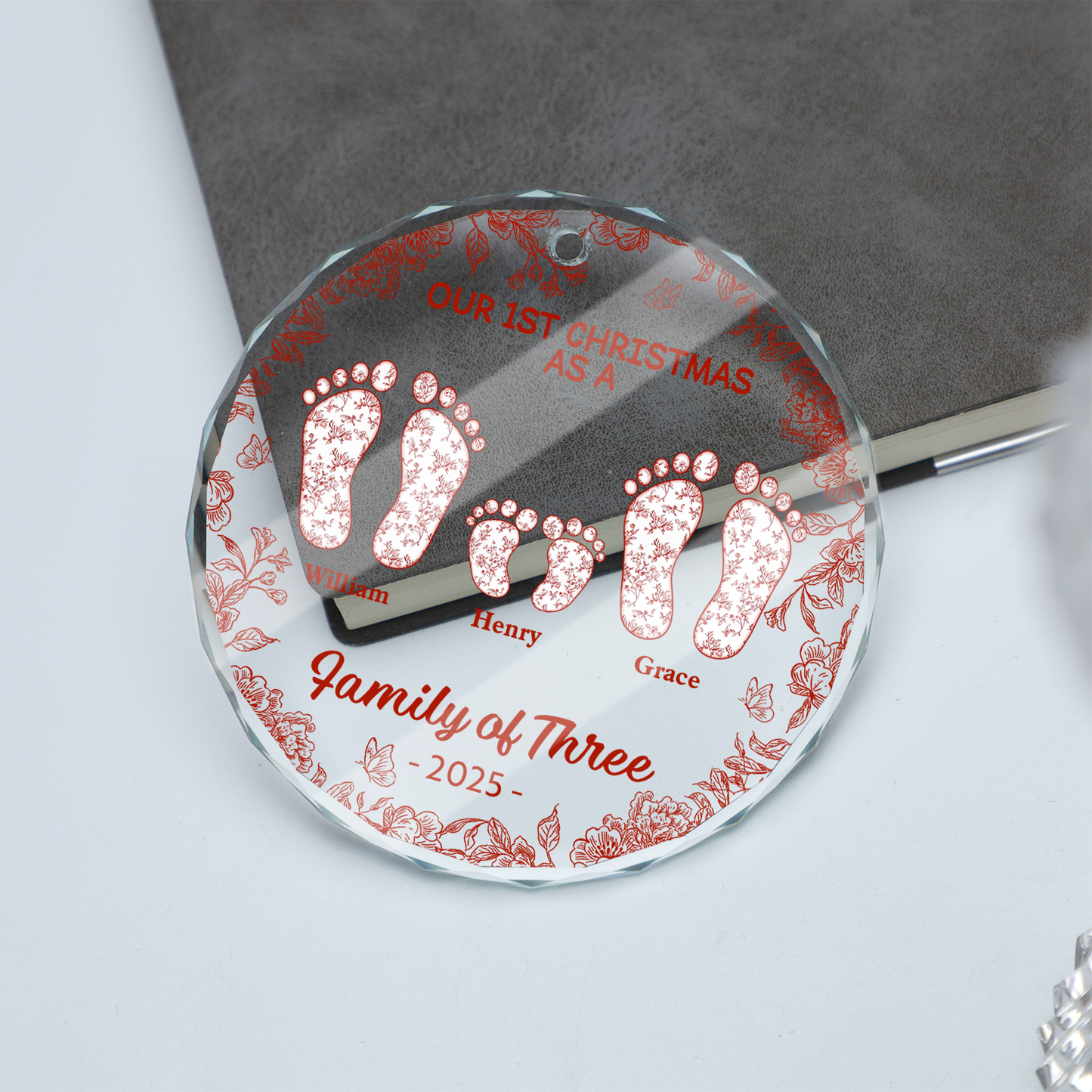 Personalized "Our First Christmas" custom glass ornament.