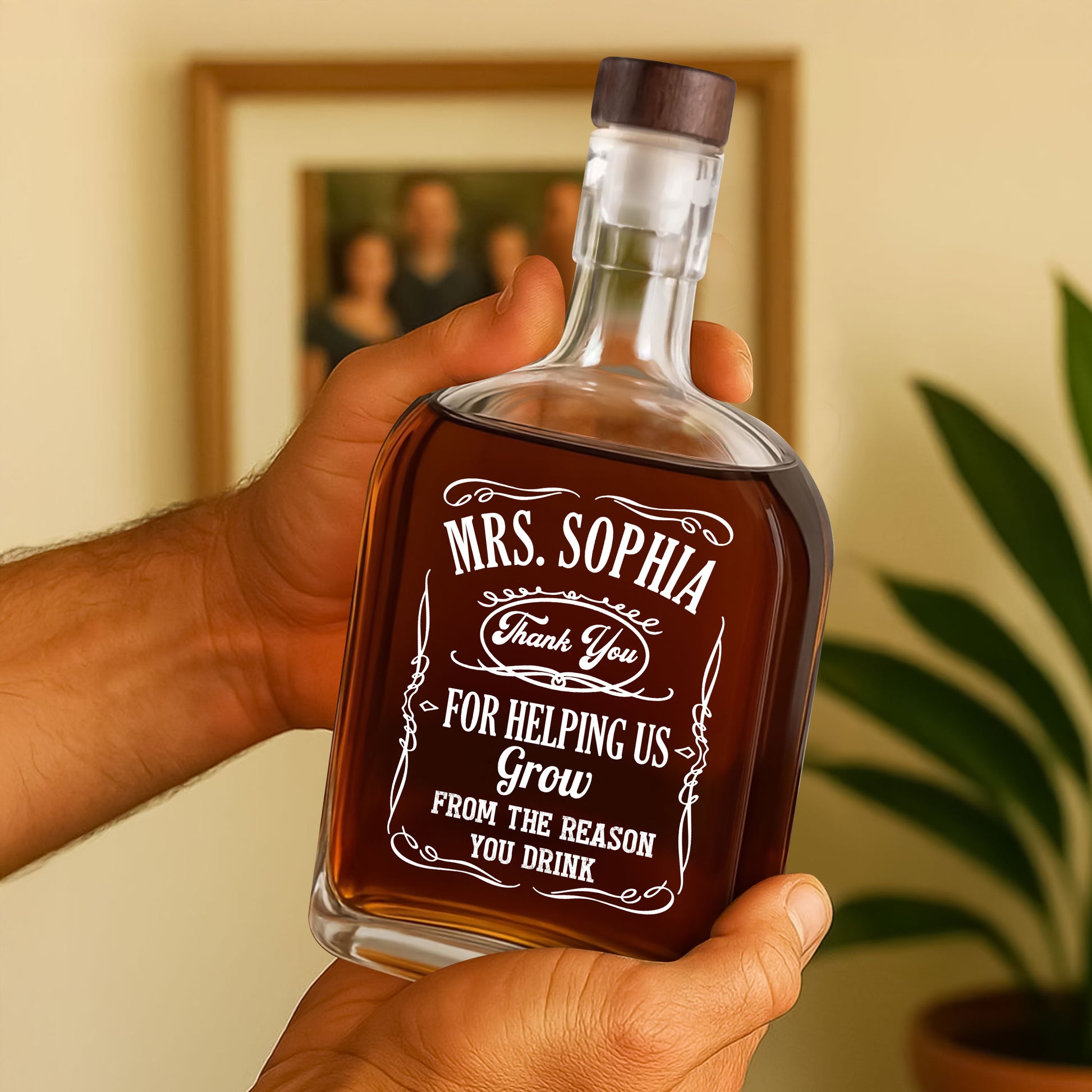 Personalized whiskey bottle for teachers, engraved with a custom design.