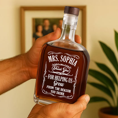 Personalized whiskey bottle for teachers, engraved with a custom design.