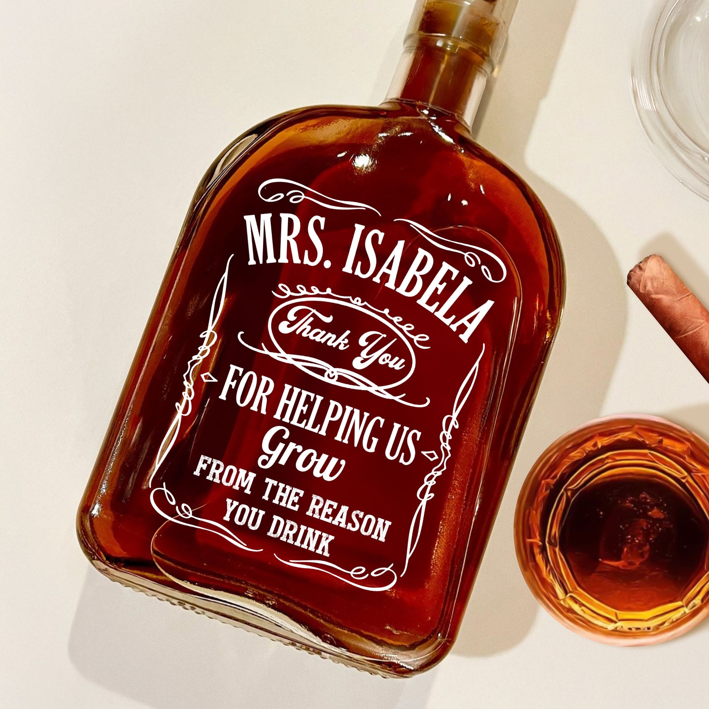 Personalized whiskey bottle for teachers, engraved with a custom design.