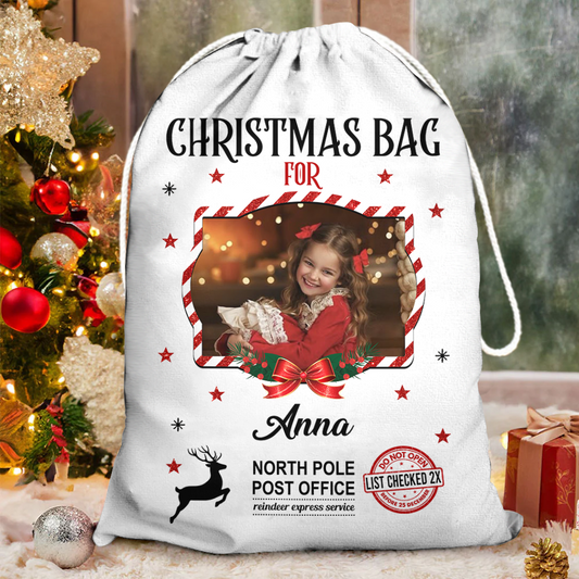 Personalized Christmas photo bag; a festive gift sack for family with custom picture.