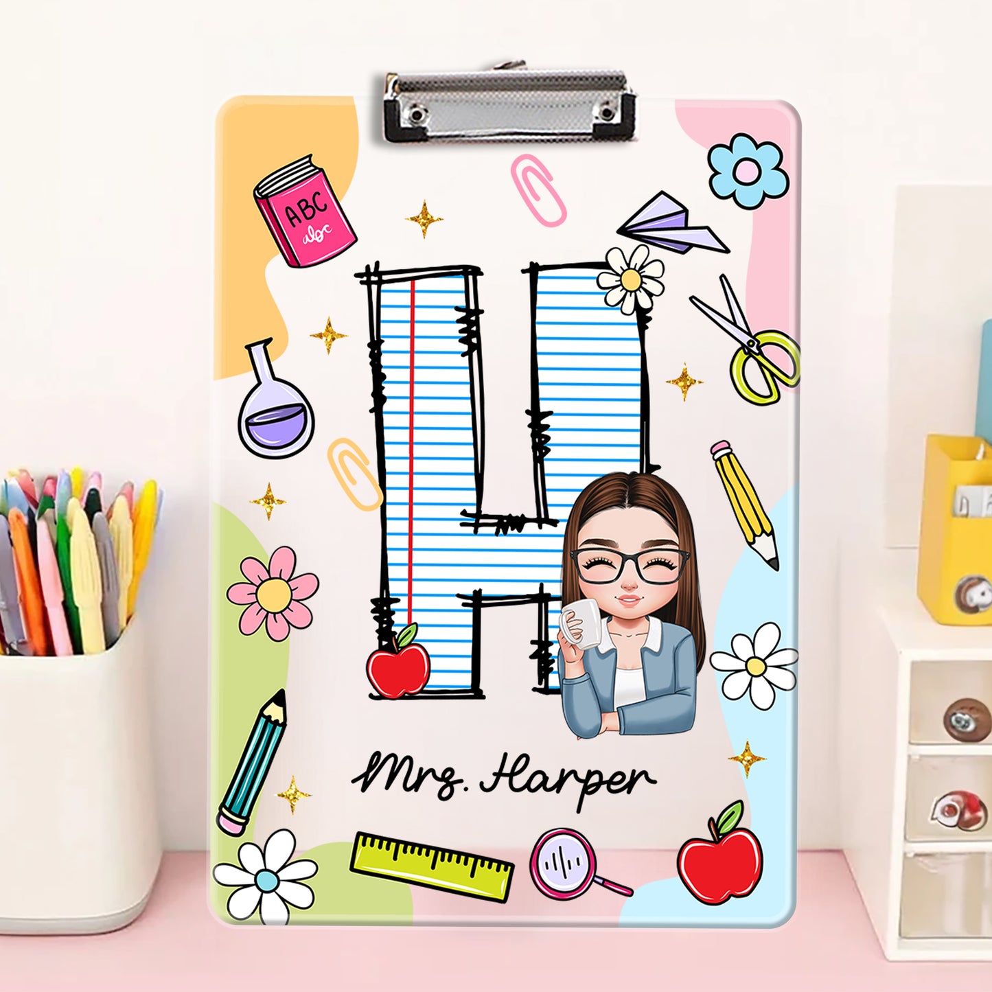 Personalized acrylic clipboard with teacher's name, a custom letter name gift from Jillian Customs.