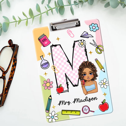 Personalized acrylic clipboard with teacher's name, a custom letter name gift from Jillian Customs.