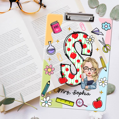 Personalized acrylic clipboard with teacher's name, a custom letter name gift from Jillian Customs.