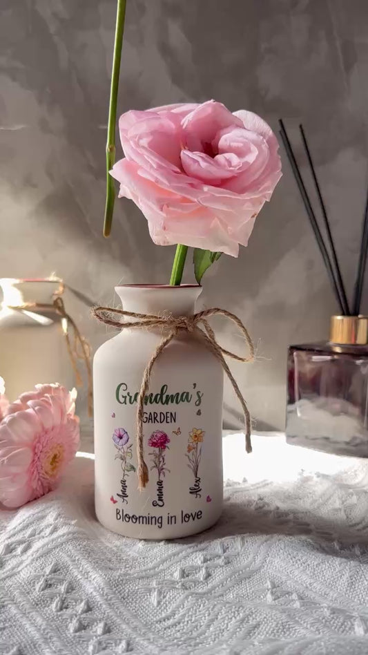 Elegant white ceramic flower vase with "Grandma's Garden is Grown with Seeds of Love" design.