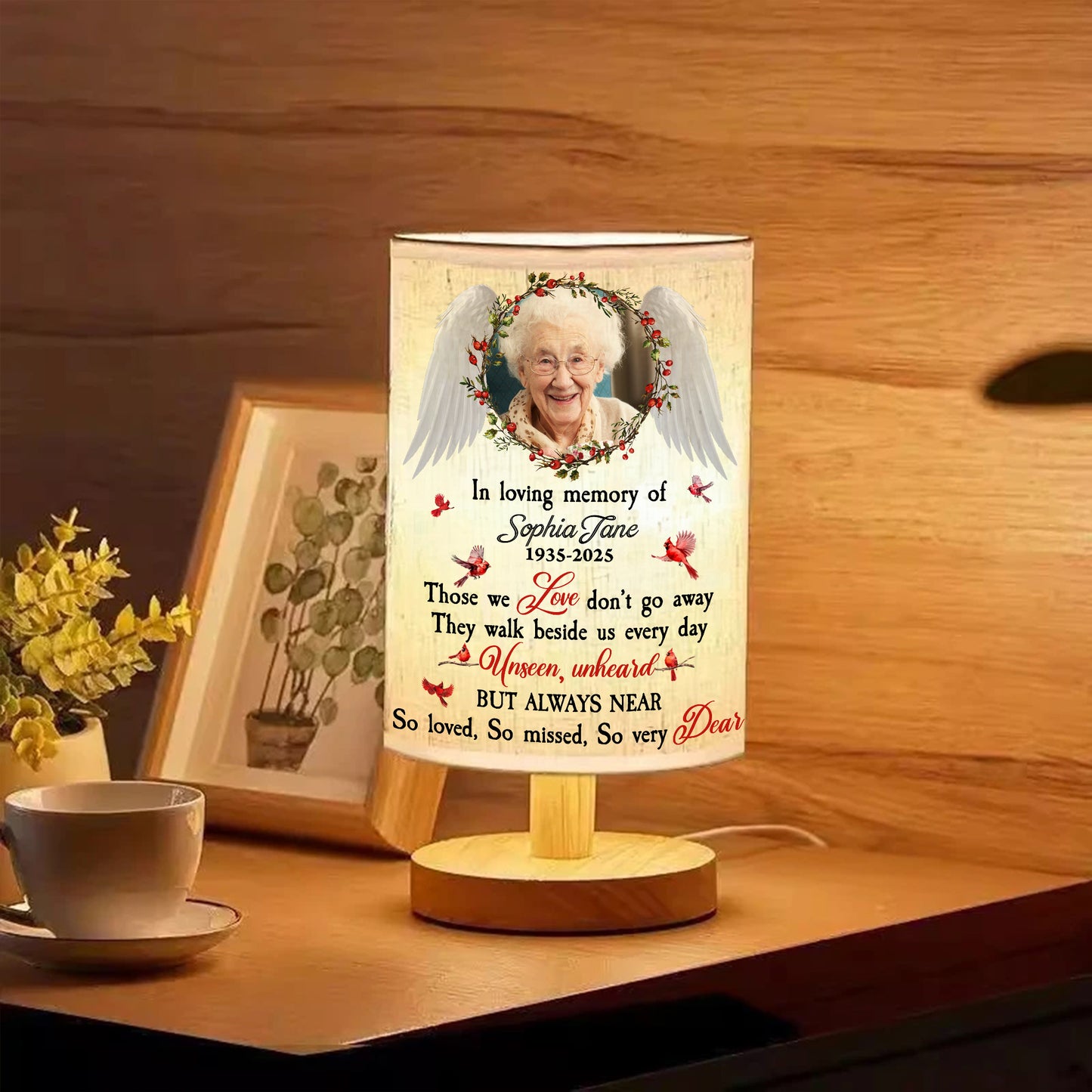 So Very Dear custom photo lamp showcasing personalized fabric with family photos.