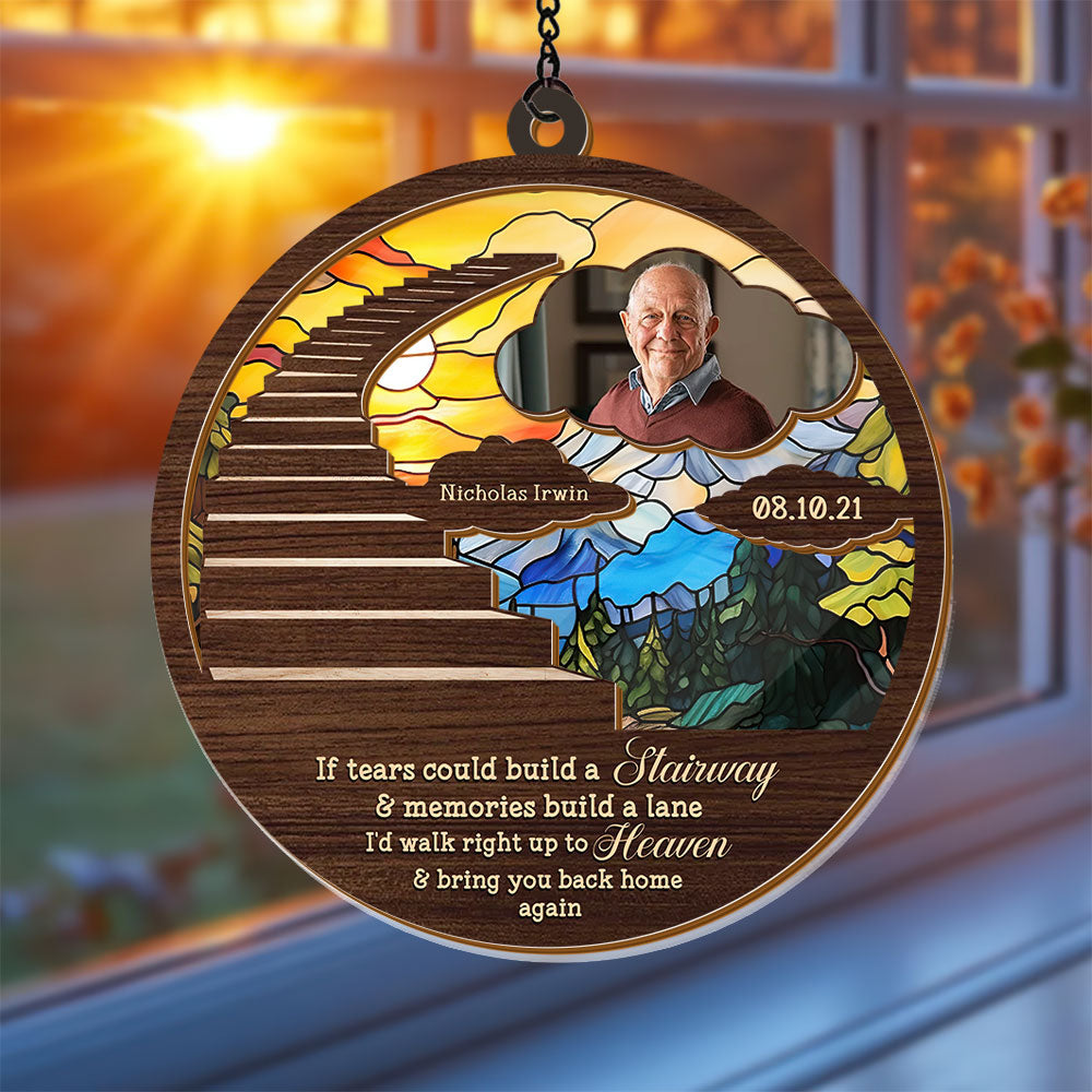 Stairway to Heaven personalized suncatcher ornament hanging in a window, casting colorful light.