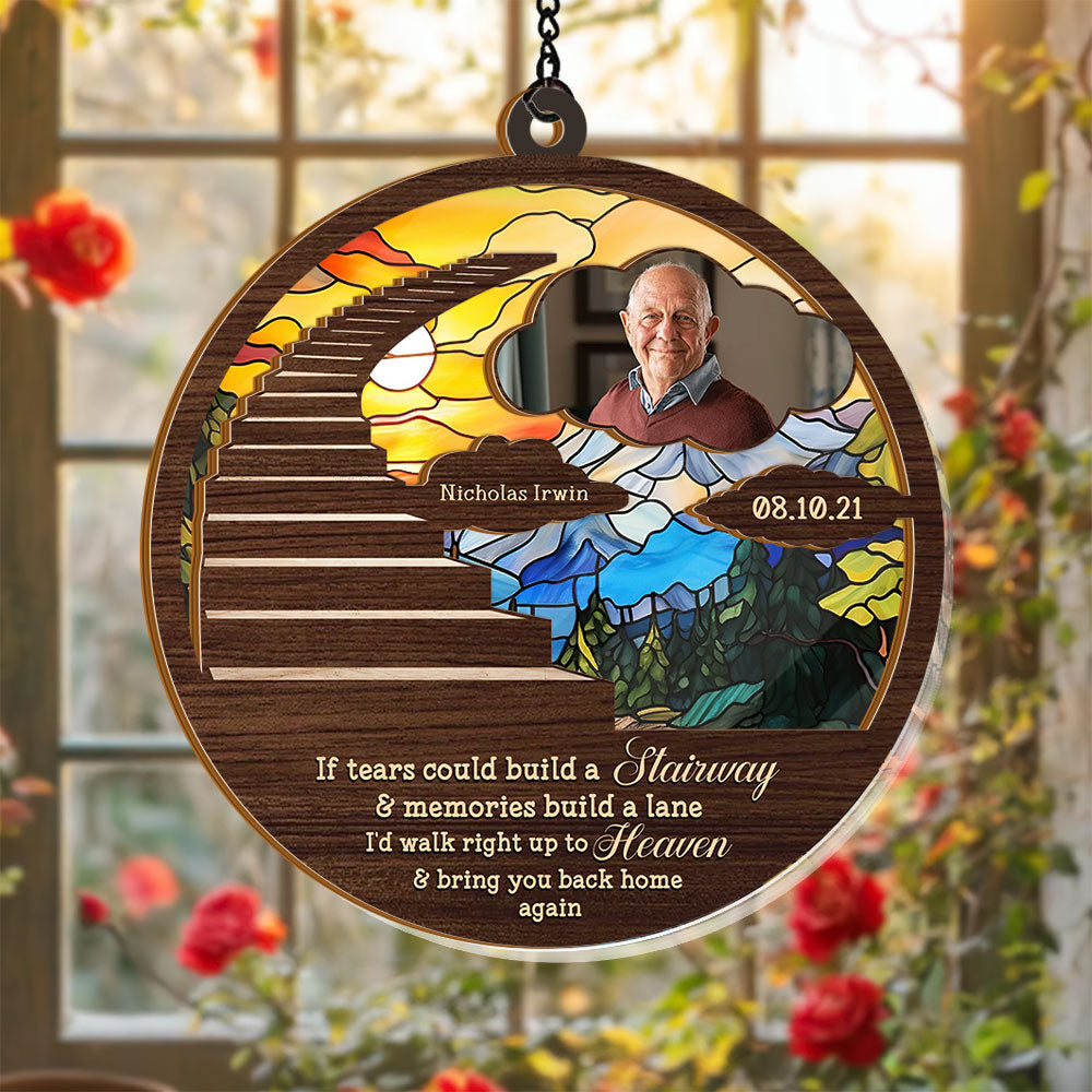 Stairway to Heaven personalized suncatcher ornament hanging in a window, casting colorful light.