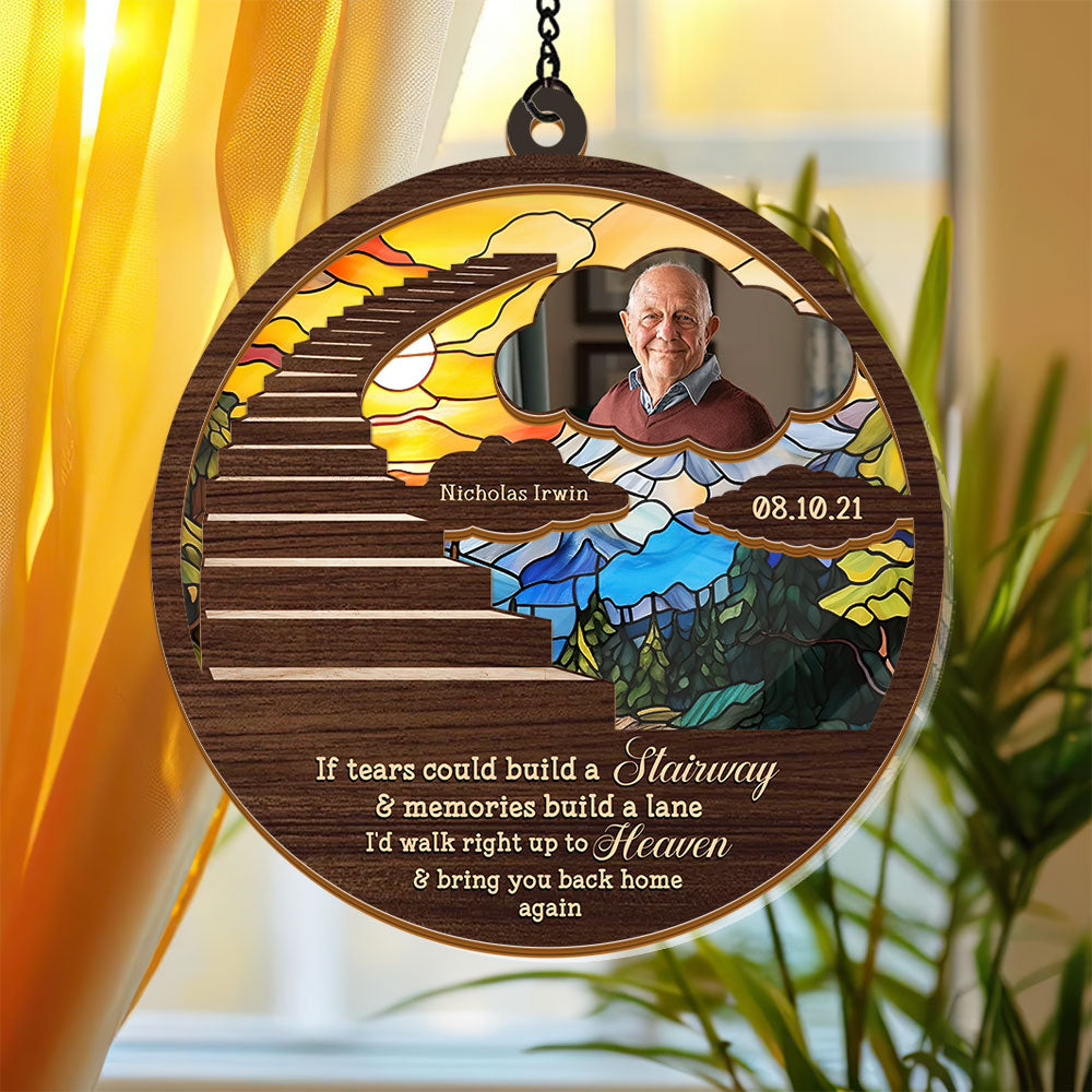 Stairway to Heaven personalized suncatcher ornament hanging in a window, casting colorful light.