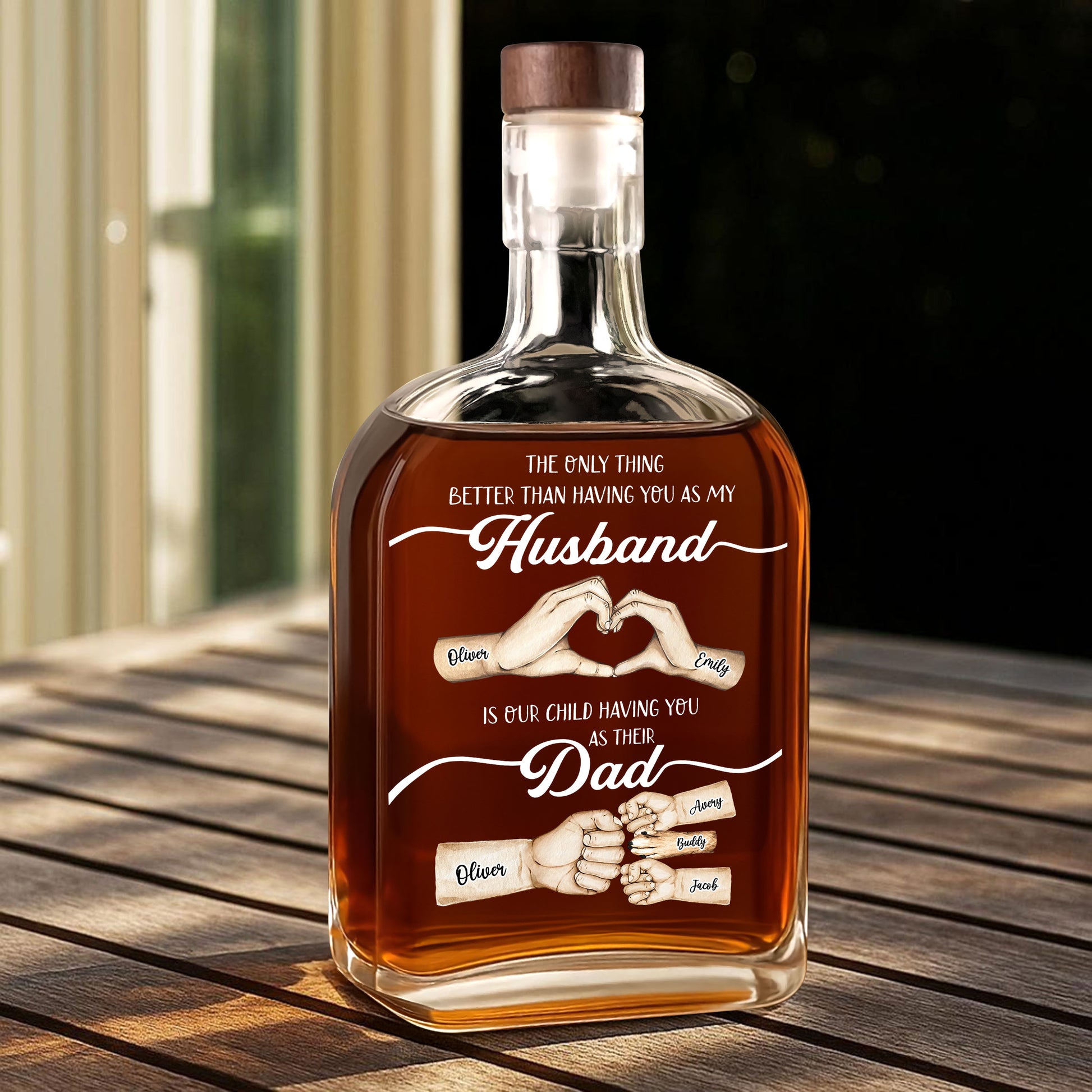 Personalized whiskey bottle with family name and "The Best Things Our Family" engraving.