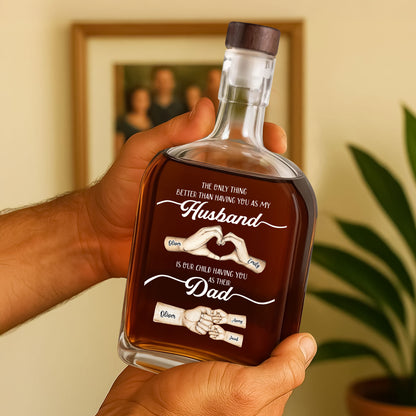 Personalized whiskey bottle with family name and "The Best Things Our Family" engraving.