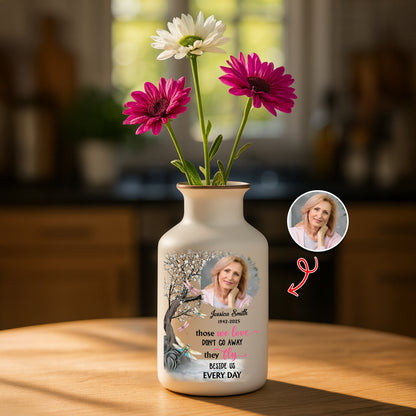 Elegant white ceramic flower vase from Jillian Customs. Minimalist design.