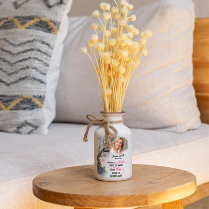 Elegant white ceramic flower vase from Jillian Customs. Minimalist design.