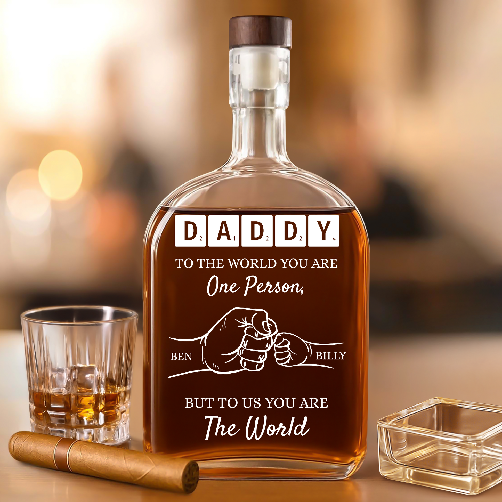 Personalized whiskey bottle with custom engraving that reads "To Your Family You Are The World, Our Family."