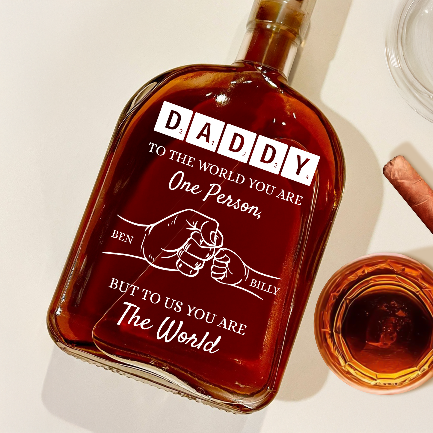 Personalized whiskey bottle with custom engraving that reads "To Your Family You Are The World, Our Family."