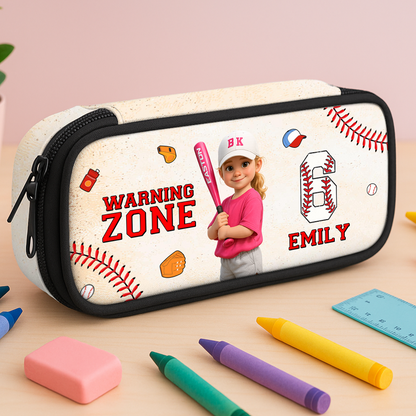 Personalized "Warning Zone" pencil case with custom name on a black and yellow striped background.