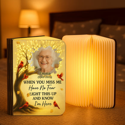 Personalized memorial book lamp with custom text. Unique remembrance gift.