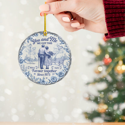 Personalized glass ornament with "You, Me, We Got This" for anniversary gifts.