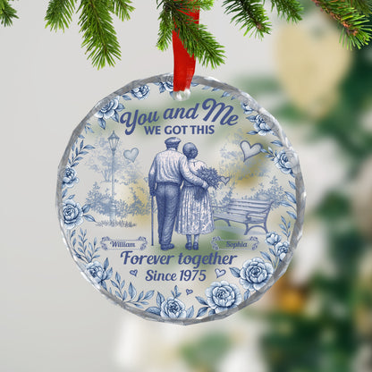 Personalized glass ornament with "You, Me, We Got This" for anniversary gifts.